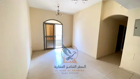 غرفتين وصاله مع بلكونه وتكييف مركزي موقع مميز بجوار مدرسة  الحكمه وقريب لمخرج دبي والخدمات