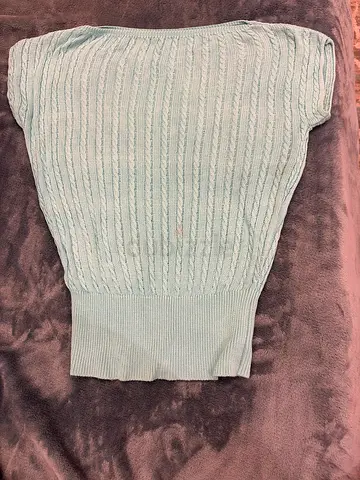 Light blue knitted sleeveless top