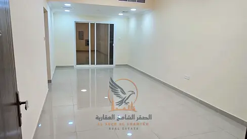 Two-bedroom apartment with a living room and balcony, spacious and in a prime location, with one month free of charge for the annual rent in Ajman.