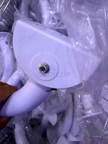 Lot of white handheld shower heads - new/packagedJ brackets for cameras