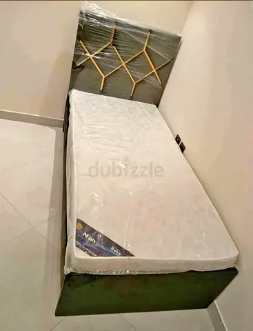Single bed with mattress and padded headboard - good condition