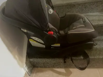 Infant rear-facing car seat with base — and pad