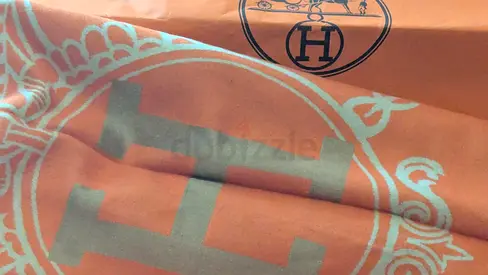 Orange designer-style silk scarf with H motif (pre-owned)