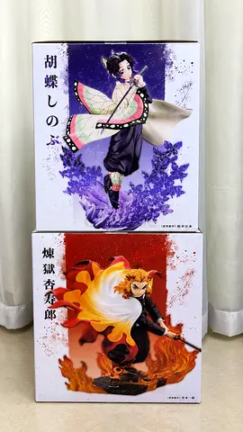 Pair of Demon Slayer (Shinobu & Kyojuro) collectible figures - boxed