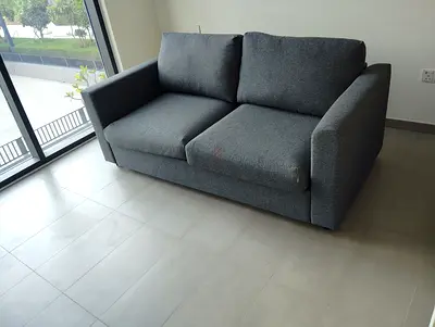 2-seater grey fabric sofa in good condition