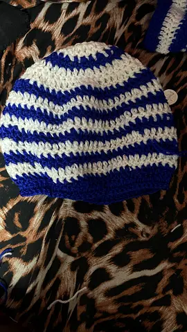 Handmade blue and white striped crochet beanie
