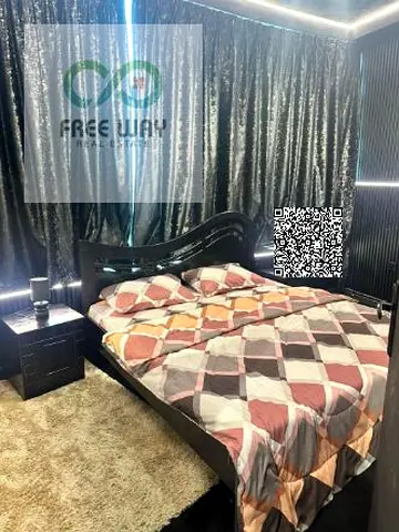 For annual rent in Ajman, Orient Towers: Apartment for rent, consisting of one bedroom and a living room. Fully furnished. Two bathrooms.