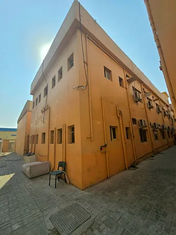 مبنى سكن عمال للإيجار – الجرف الصناعية 1، عجمان بلوك كامل يضم 52 غرفة | شامل الفواتير