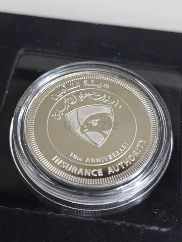 Uae silver coin ,insurance with box.