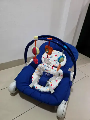 Blue baby rocker/bouncer with toy bar - good condition