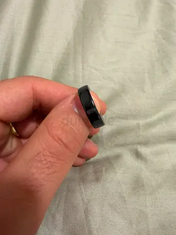 Oura ring 5 with charger size 11 , good condition.