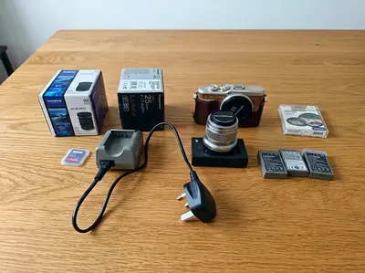 Olympus Pen EPL9 4k mirrorless camera with 3 lenses, 3 batteries, 1 ND filter, MFT