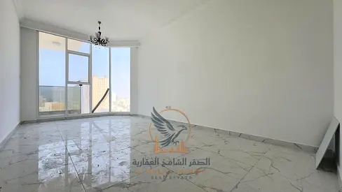 Two-bedroom apartment with a living room, sea view, and private parking for annual rent in Al Nakheel 1, Ajman