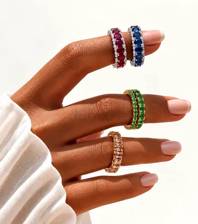 Set of 4 Gemstone Eternity Rings – Ruby, Sapphire, Emerald, and Champagne Stones