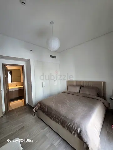 Queen bed with built-in wardrobe in master bedroom - ready to move with 30% discount