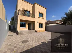 Villa for rent in Al Mowaihat 3 Ajman, 4 master bedrooms, hall, majlis, large yard & covered parking
