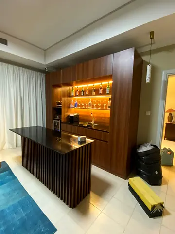 Custom Walnut Bar Cabinet with Island and Backlit Shelving