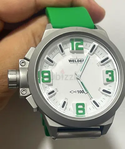 Welder, U_BOAT large men's watch with green strap.very good condition like new