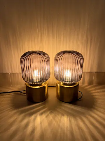Pair of IKEA Solklint modern brass bedside lamps with ribbed glass shades