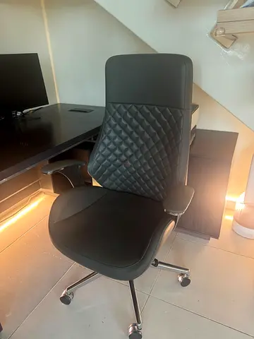 Desk + Monitor+ grey ergonomic office chair with quilted backrest — good condition