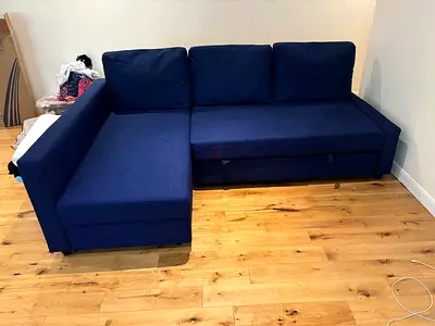 Blue L-shaped Sofa bed with Storage - Good Condition