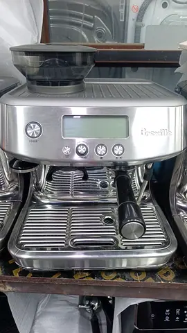 Breville stainless steel espresso machine with integrated grinder
