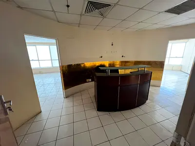 Office for annual rent in Al Rolla, Sharjah | Prime location close to amenities | Free air conditioning | Suitable for various commercial and professi