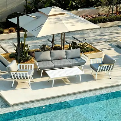white aluminium outdoor lounge sofa set, complete with beautiful grey cushions