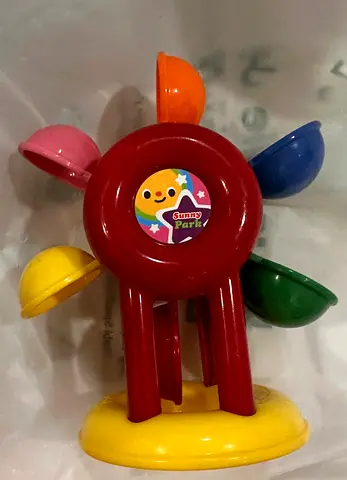 Ferris wheel toy with and without water both
