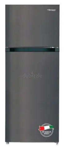 Used two-door refrigerator with top freezer - good working condition.