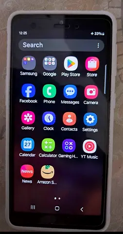 Samsung smartphone in good working condition with case