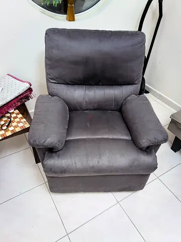 Grey single-seater Homebox recliner armchair in good condition