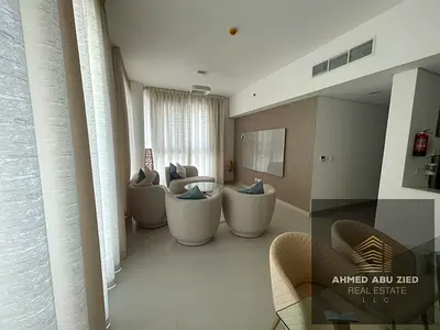 A stunning furnished apartment with a sea view in a prime location (Ajmal Makan City, Sharjah). Features: 2 master bedrooms, a living room, parking,
