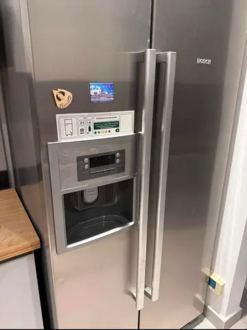 Bosch Side-by-Side Refrigerator with Water Dispenser - Stainless Steel