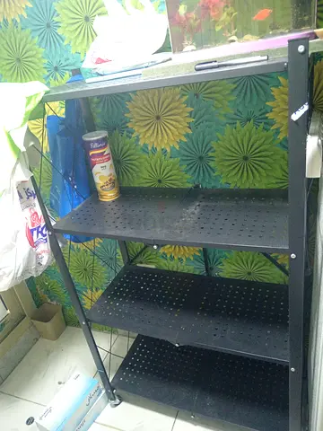 Black metal 4-tier shelving unit - sturdy storage rack