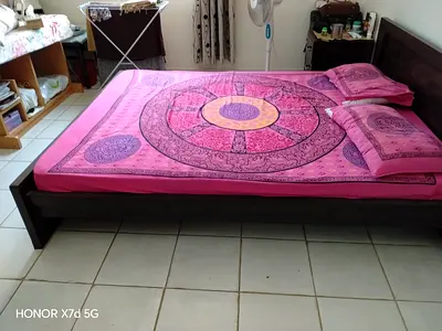 Solid dark wood double bed frame with headboard - good condition