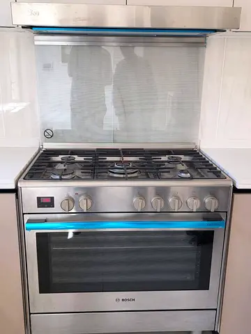 Bosch new model  Stainless Steel Gas Range with electric oven - Good Condition