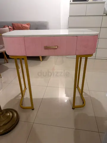 Pink upholstered table with gold legs - excellent condition