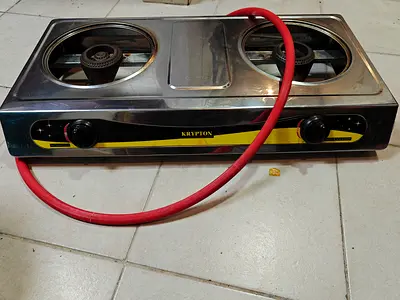 Gas stove with regulator.