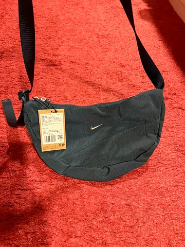 Nike black crossbody / waist bag with tag (used)