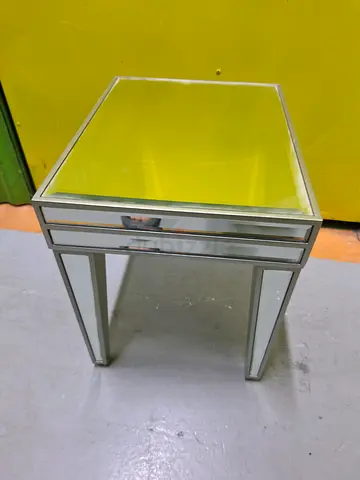 Glass-top side table with mirrored frame