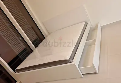 Ikea king size bed with mattress and storage drawers