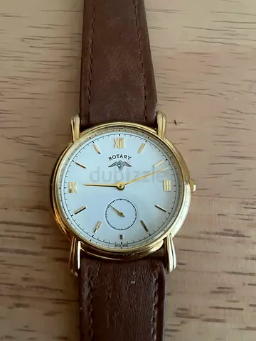 Vintage Rotary Swiss Made classic gold-tone men's wristwatch with brown leather strap