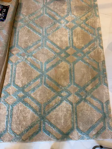 Light beige and blue geometric area rug - good condition