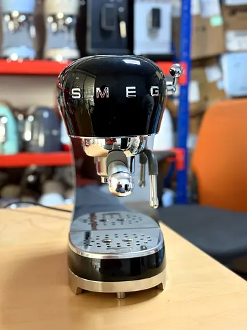 Smeg coffee machine black color. Brand new. ECF02