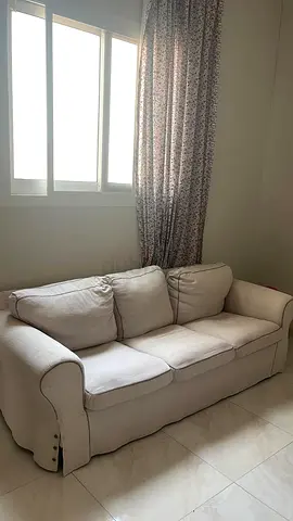 3-seater beige fabric sofa — good condition