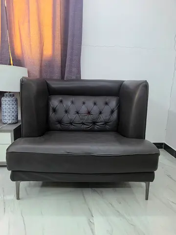 Large Modern dark brown leather single-seater armchair with tufted back