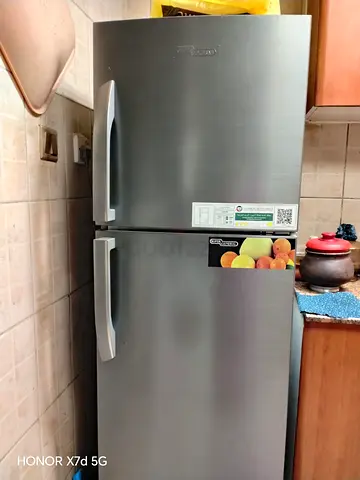 Silver double-door refrigerator - good working condition