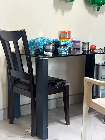 Glass dining table without chairs - 120 L* 70 W *80 H cms