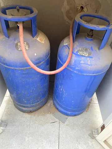 Two used blue LPG gas cylinders - good working condition , the price for 2 cylinders